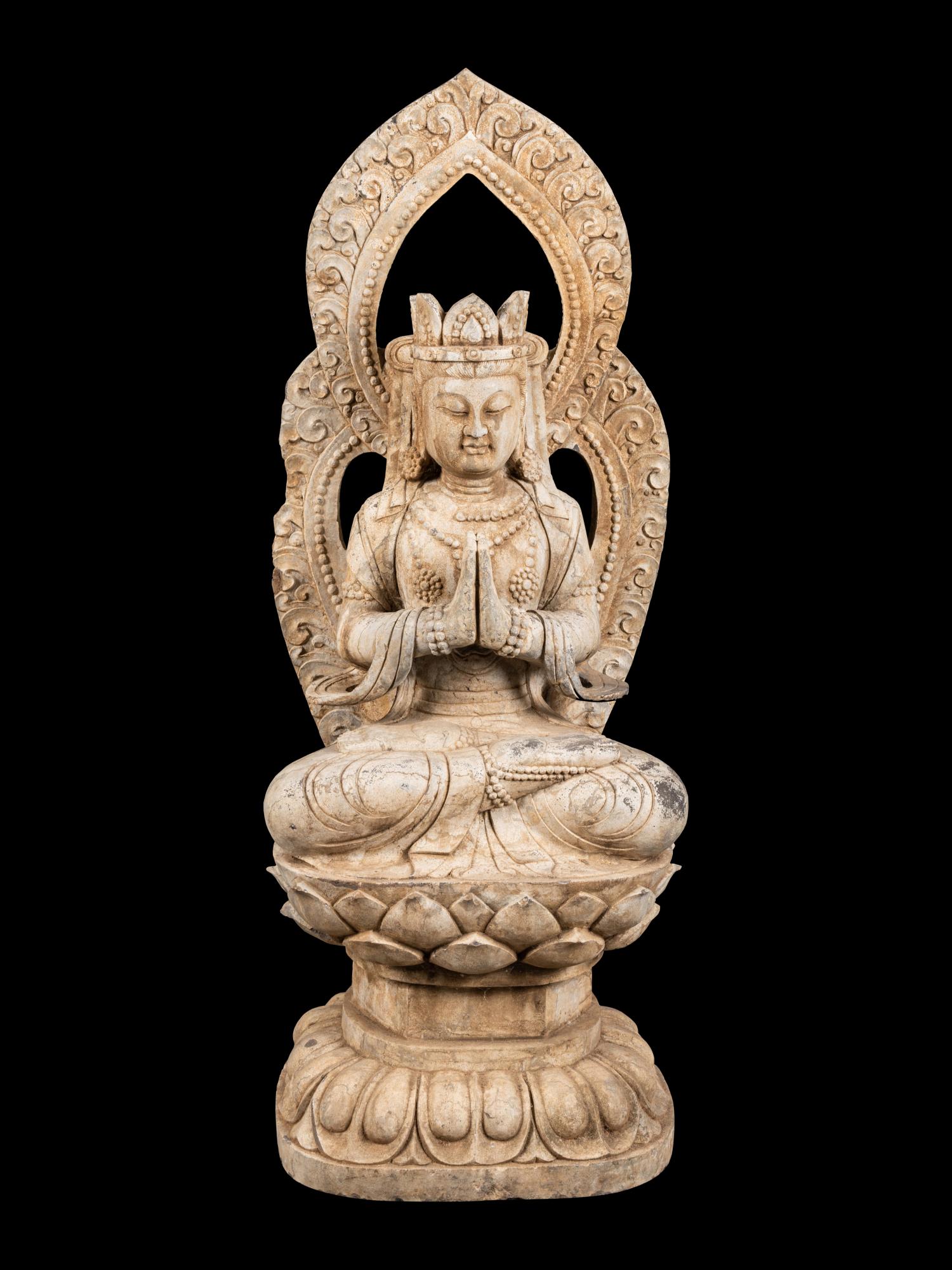 A Chinese Carved Stone Seated Guanyin Figure (1 of 3)
