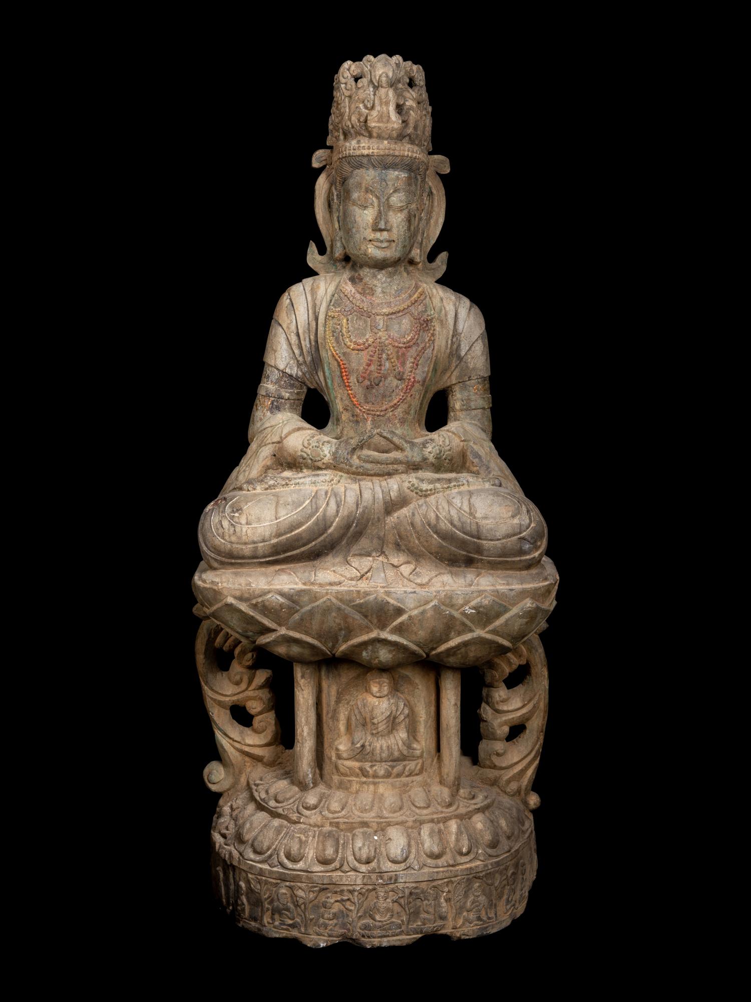 A Chinese Carved Stone Seated Guanyin Figure (1 of 4)