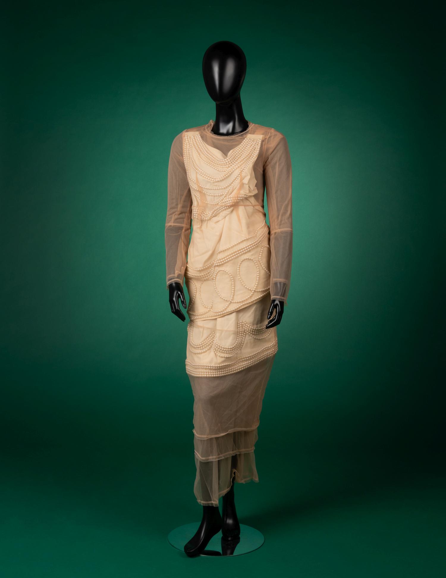 Comme des Garcons Nude Net and White Cotton with Pearls: Comme des Garcons Nude Net and White Cotton with Pearls Evening Dress, Fall 2009 "Wonderland, where nothing is as it seems" encapsulates Rei Kawakubo's Fall/Winter 2009 collection where pieces were co