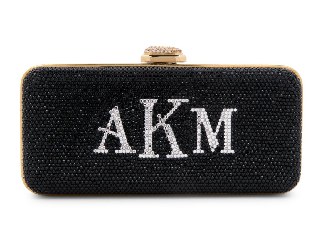 Judith Leiber "AKM" Monogrammed MinaudiÃ¨re: Judith Leiber "AKM" Monogrammed MinaudiÃ¨re Rectangular black crystal encrusted minaudiÃ¨re with personalized monogram "AKM" in white crystals set into gold-tone frame, retractable shoulder straps