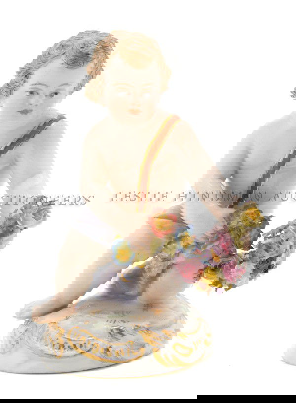 A Meissen Porcelain Figure, Height 3 1/2 inches.: A Meissen Porcelain Figure, 19th century, depicting putti with floral garland, impressed 131, incised b49, having crossed swords mark in underglaze blue. Height 3 1/2 inches. Property from the Estate