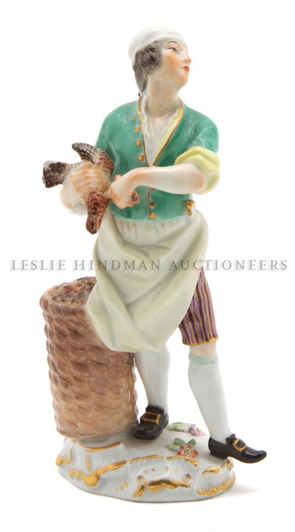A Meissen Porcelain Figure, Height 5 3/8 inches.: A Meissen Porcelain Figure, late 19th century, depicting a bird merchant, impressed 104, incised 25, having crossed swords mark in underglaze blue. Height 5 3/8 inches. Property from the Estate of Ric