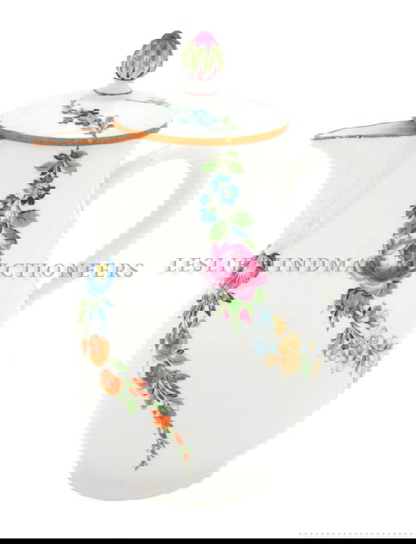 A Meissen Covered Pitcher, Height 6 1/2 inches.: A Meissen Covered Pitcher, marked with starred crossed swords mark. Height 6 1/2 inches. Property from the Estate of John and Valere Butterwick, Kewanee, Illinois