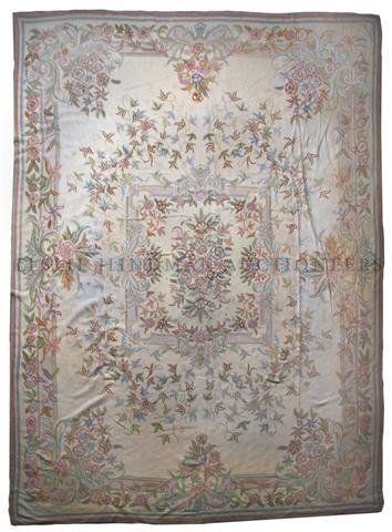 A Pair of Aubusson Style Carpets, 11 feet 6 inches: A Pair of Aubusson Style Carpets, each with foliate center medallion within conforming borders. 11 feet 6 inches x 8 feet 7 inches.