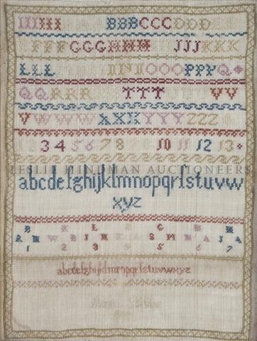 An English Needlepoint Sampler, Height (visible) 1: An English Needlepoint Sampler, 1817, Ann Bibby, framed. Height (visible) 13 x width 9 7/8 inches.