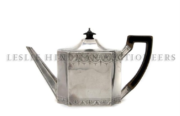 An English Silver Teapot, Robert Hennell I, Height: An English Silver Teapot, Robert Hennell I, London, late 18th century, of octagonal form, with wood handle and finial; approximate total weight 14.15 ozt. Height overall 6 inches. Property from the Es