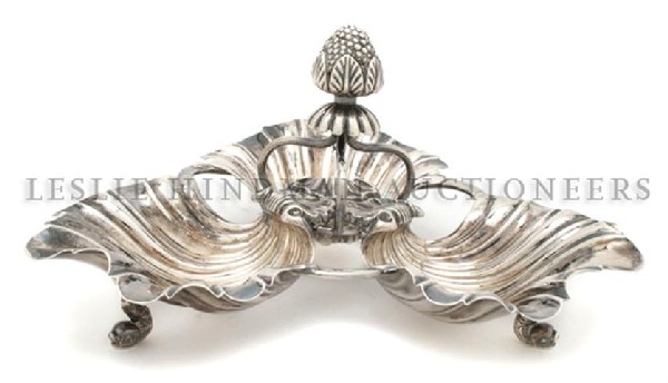 An English Silver Candy Dish, Robert Gainsford, Wi: An English Silver Candy Dish, Robert Gainsford, Sheffield, 1809, of three shelled form, raised on dolphin feet; approximate total weight 12.02 ozt. Width at widest 8 5/8 inches.