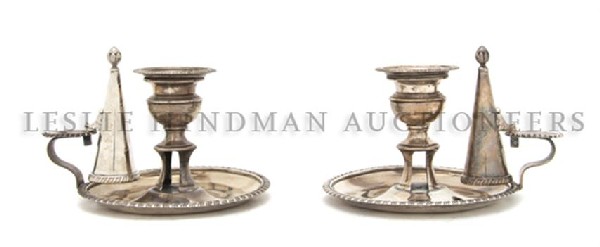 A Pair of English Silver Chambersticks, William Bu: A Pair of English Silver Chambersticks, William Burwash, London, 1813, of round form, having gadrooned edge decoration; approximate total weight 26.43 ozt. Height 4 1/2 inches.