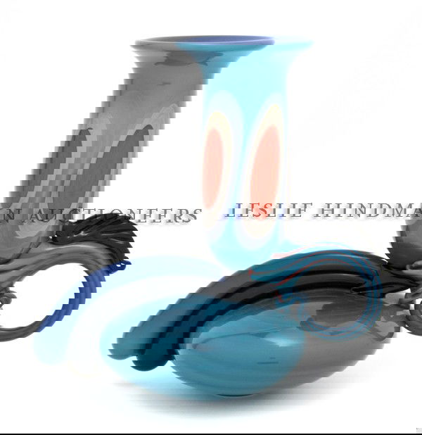 A Glass Vase, Robert Levin, Height 8 1/2 inches.: A Glass Vase, Robert Levin, Space Cup, the blown glass vase having elongated pulled oval pattern on the bowl, raised on a circular foot, signed on the underside. Height 8 1/2 inches.