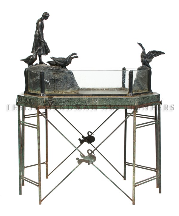 An Austrian Bronze Figural Group, Friedrich Gorni: An Austrian Bronze Figural Group, Friedrich Gornik (1895-1925), depicting a peasant girl standing on a rock with a flock of geese, The Pond. Height 19 inches x width 7 inches (excluding base).
