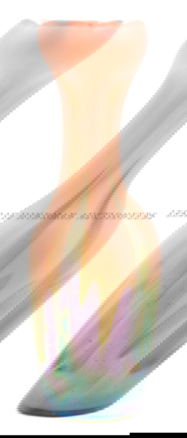 A Loetz Iridescent Glass Vase, Height 14 inches.: A Loetz Iridescent Glass Vase, of bottle form, with ruffled rim, the lobed body having pulled decoration, signed Loetz Austria. Height 14 inches. Property of a Private Southeast Michigan Collector