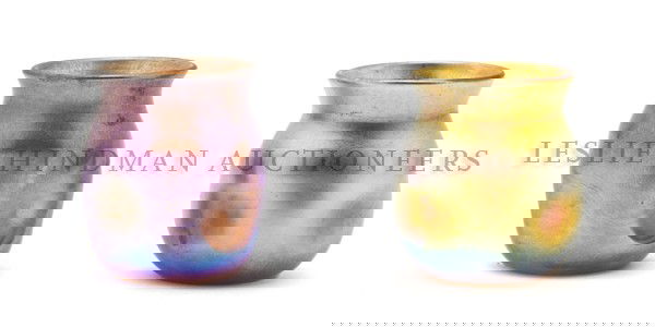 Two Tiffany Favrile Glass Toothpick Holders, Heig: Two Tiffany Favrile Glass Toothpick Holders, each having flared rims and pinched sides. Height of each 1 5/8 inches. Property from the Estate of A. J. Lemkey, Oak Park, Illinois