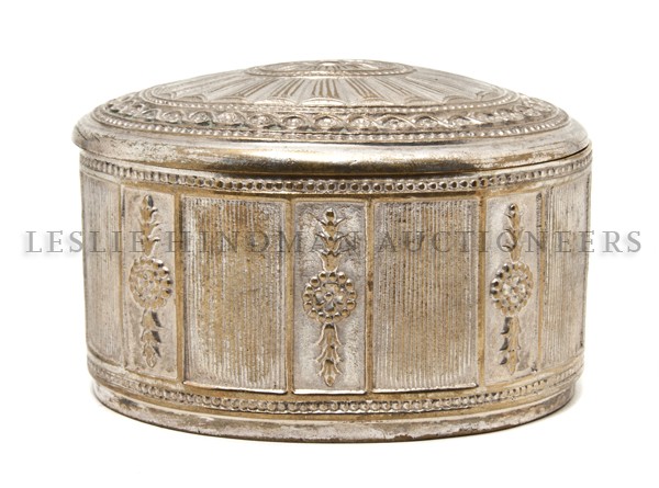 A Tiffany Studios Silvered Bronze Inkwell, Width : A Tiffany Studios Silvered Bronze Inkwell, in the Adams pattern, of oval form, numbered 1777. Width 4 inches.