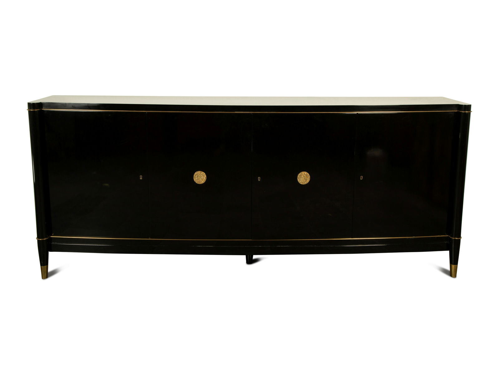 An Art Deco De Coene Freres Ebonized Cabinet Height 38: An Art Deco De Coene Freres Ebonized Cabinet 20TH CENTURY with maker's label on right door interior. Height 38 1/2 x width 93 x depth 20 inches. Karl Kemp, New York, NY