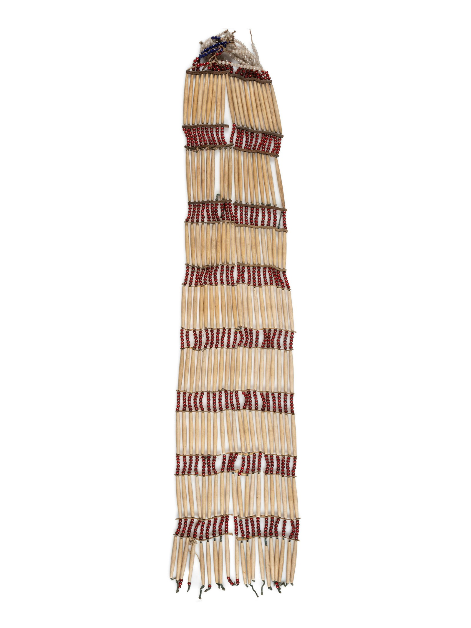 Plains Woman's Bone Hairpipe Breastplate: Plains Woman's Bone Hairpipe Breastplate first quarter 20th century strung with alternating rows of bone hair pipes and red glass beads separated with leather and rawhide spacers length 47 inches Plea