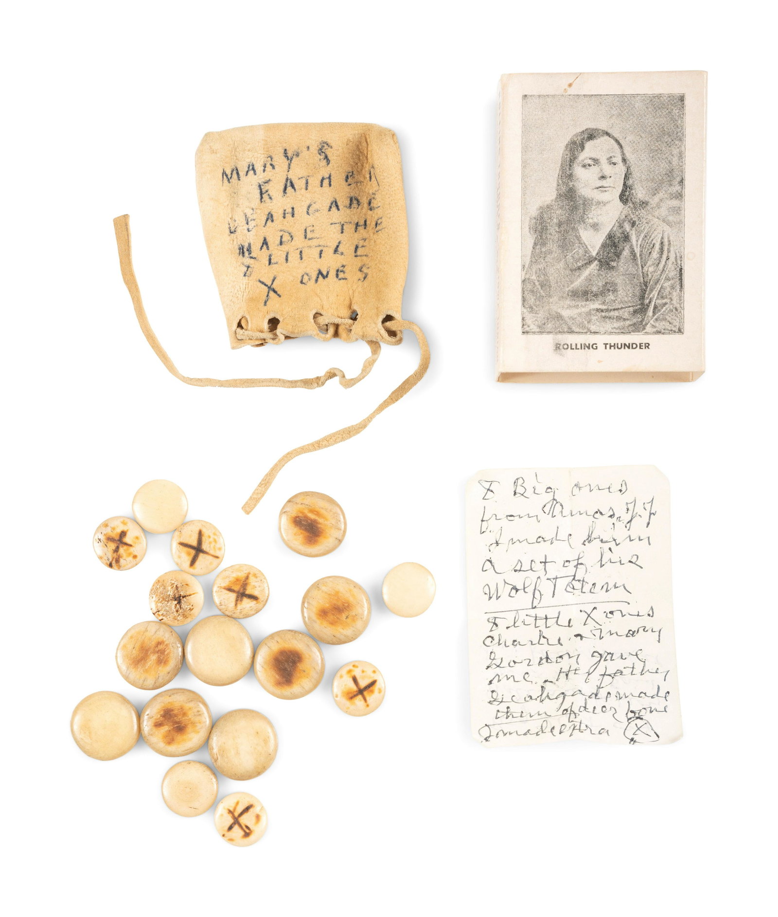 Bone Dice for Playing Waltes: Bone Dice for Playing Waltes early 20th century 17 bone dice; included is a handwritten note: 8 big ones from Amos J.J. I made him a set of his wolf totem / 8 little X ones Charlie and Mary Gor