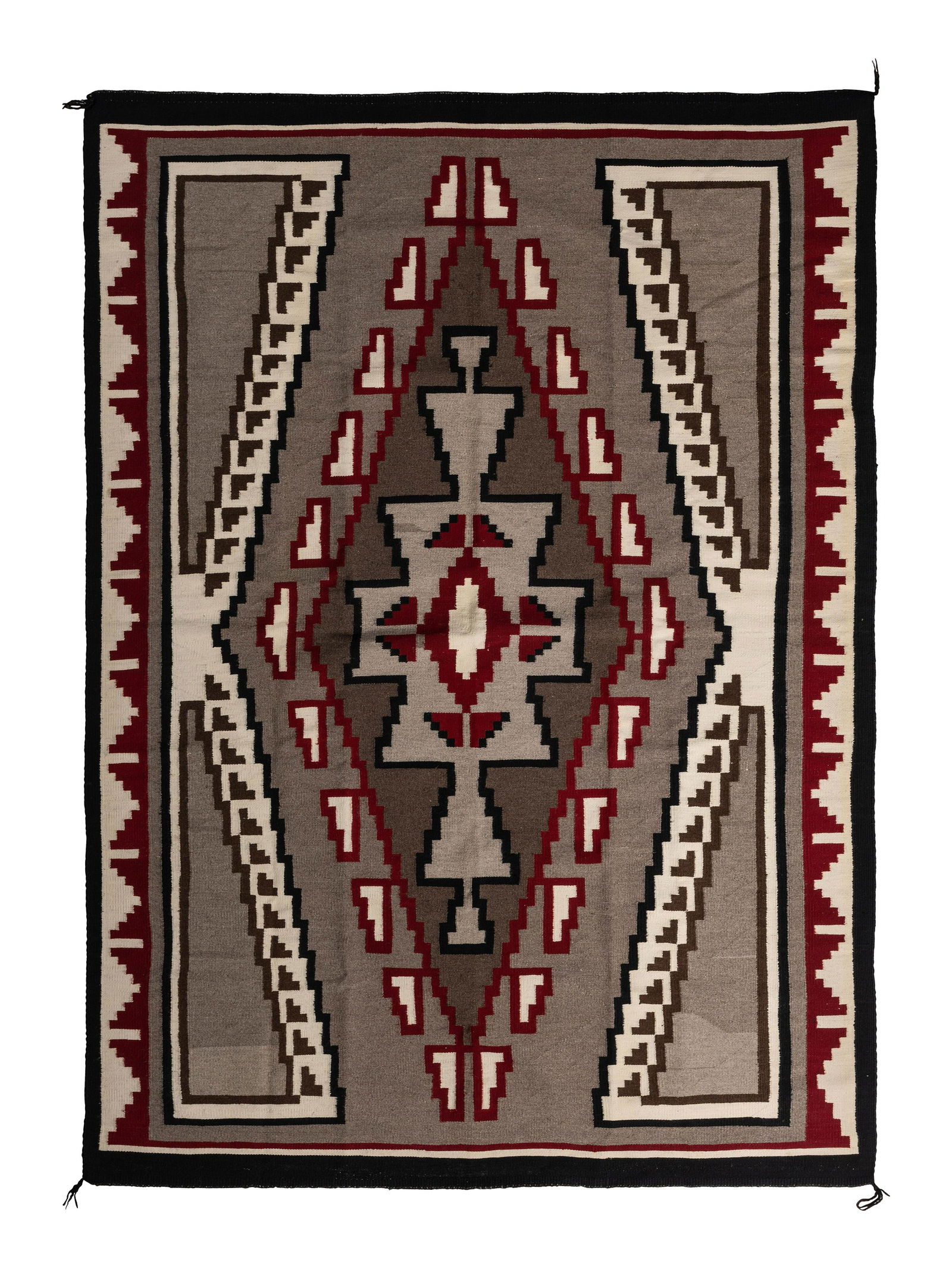 Navajo Klagetoh Weaving / Rug: Navajo Klagetoh Weaving / Rug second half 20th century woven using hand-spun wool in colors of red, black, cream, grey, and brown; elongated stepped diamond in the center 86 x 63 inches Please Note: T