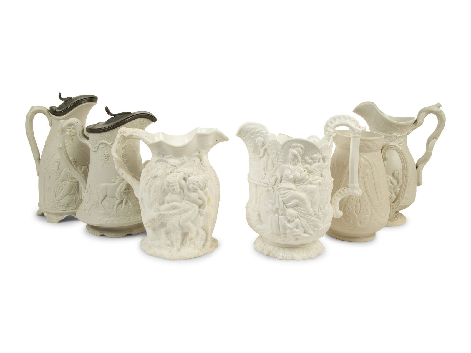 A Collection of Six English Salt-Glazed Pitchers and (1 of 7)