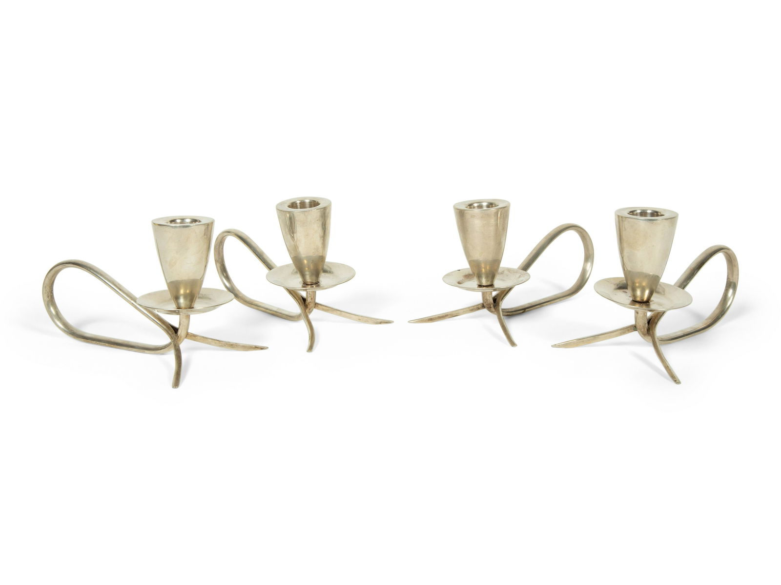 A Set of Four Mexican Silver Candle Holders (1 of 2)