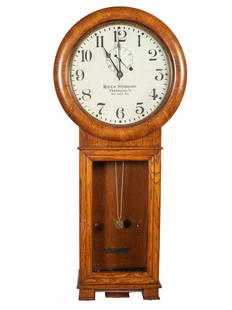 A Seth Thomas 'Ball's Standard Cleveland' Regulator: A Seth Thomas 'Ball's Standard Cleveland' Regulator Clock Height 35 x width 15 3/4 x depth 5 1/2 inches.