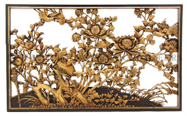 A Chinese Carved and Giltwood Panel, Height 20 x w: A Chinese Carved and Giltwood Panel, the rectangular panel having pierced carving depicting birds amongst flowering plants, bearing label from Marshall Fields on verso. Height 20 x width 30 inches. Pr
