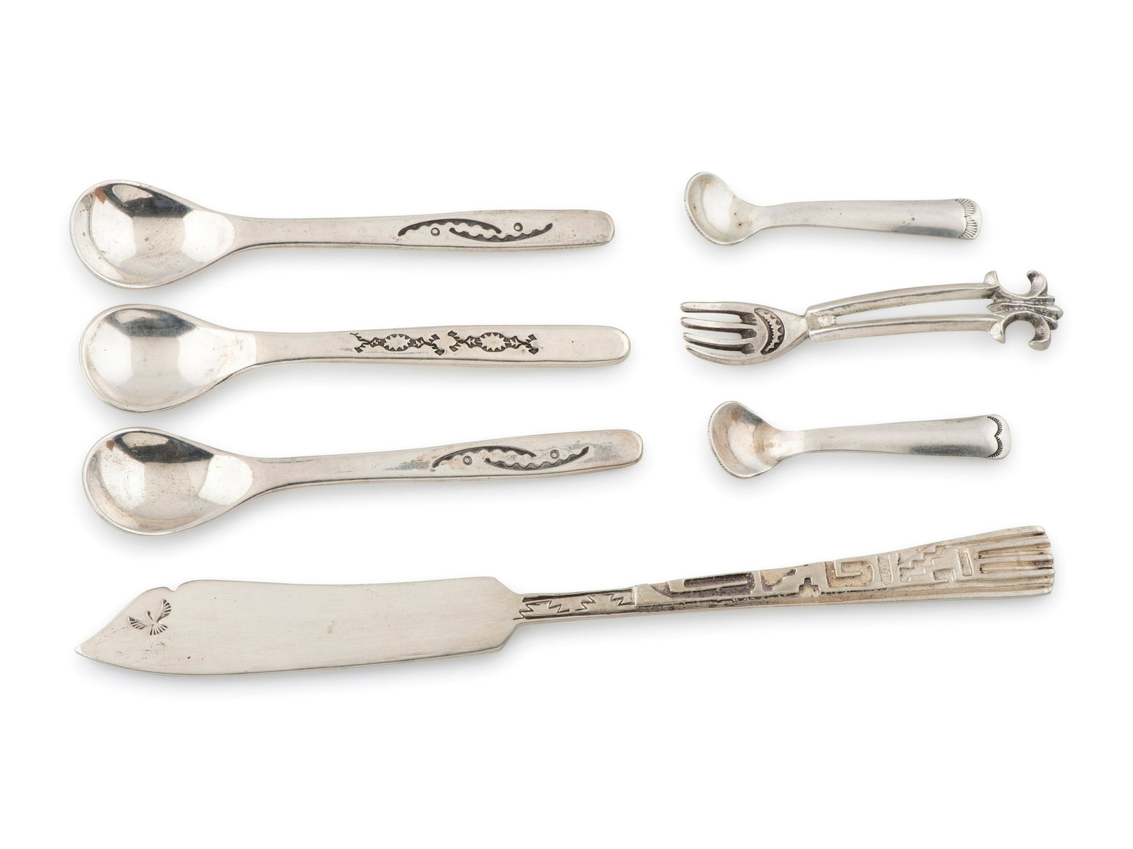 Navajo Silver Flatware: Navajo Silver Flatware second half 20th century lot of 7, includes: a cast silver butter knife; marked STERLING and signed DON PLATERO (Dine, b. 1954) length 7 inches, weight 22.3 dwt. a pair of minim