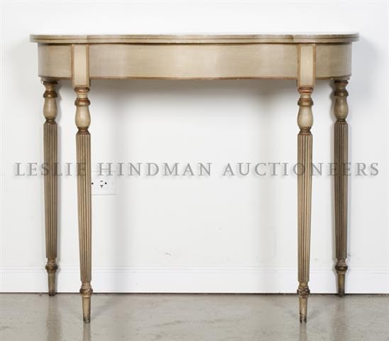 A Painted Wood Console, Height 30 x width 35 1/2 x : A Painted Wood Console, 20th century, the serpentine top raised on tapering fluted legs. Height 30 x width 35 1/2 x depth 15 1/8 inches. Property from the Estate of John and Valere Butterwick, Kewanee