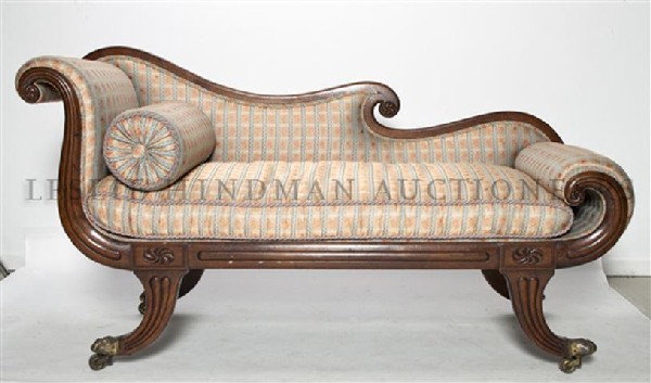 A Victorian Walnut Fainting Couch, Width 61 inches: A Victorian Walnut Fainting Couch, having upholstered back, arms and seat raised on splayed legs ending in brass caps and casters. Width 61 inches. Property of a Lady, Oakbrook, Illinois