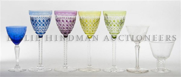A Collection of Cut or Etched Glass Stems, Height : A Collection of Cut or Etched Glass Stems, comprising four Bohemian glass stems, nine blue etched glass examples, five clear glass examples and two Steuben examples with twist stems. Height of tallest