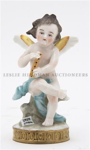 A Capodimonte Porcelain Figure, Height of first 3 : A Capodimonte Porcelain Figure, depicting a winged putto, together with an associated figure of a jester. Height of first 3 3/4 inches.