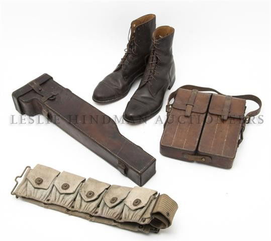A Collection of Military Surplus Articles, Length: A Collection of Military Surplus Articles, comprising boots, cartridge belts and others. Length of first 9 inches.