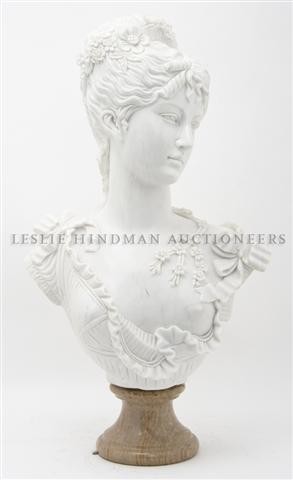 A Continental Carved Alabaster Bust, Height 25 1/2: A Continental Carved Alabaster Bust, depicting a maiden with flowers in her hair, raised on an associated marble socle. Height 25 1/2 inches. Property of a Lady, Oakbrook, Illinois