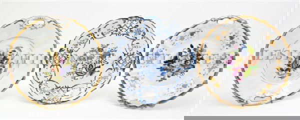 An Assembled Set of Three Berlin (K.P.M.) Plates,: An Assembled Set of Three Berlin (K.P.M.) Plates, each of handled form, with foliate decoration, together with two reticulated plates. Diameter of first 10 inches. Property of a Lady, Oakbrook, Illino