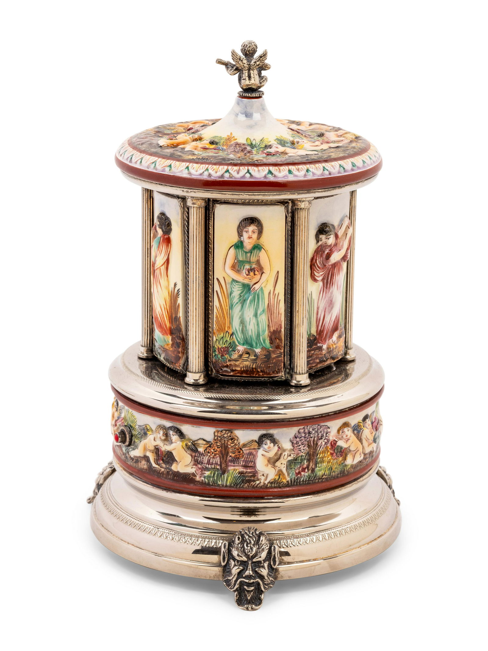 A Capodimonte Musical Cigar Box: A Capodimonte Musical Cigar Box 20th Century with a Swiss musical movement that plays "Lara's Theme" from Doctor Zhivago. Height 10 3/4 inches. Property From The Estate of Edwin L. Cox, Dallas, Texas
