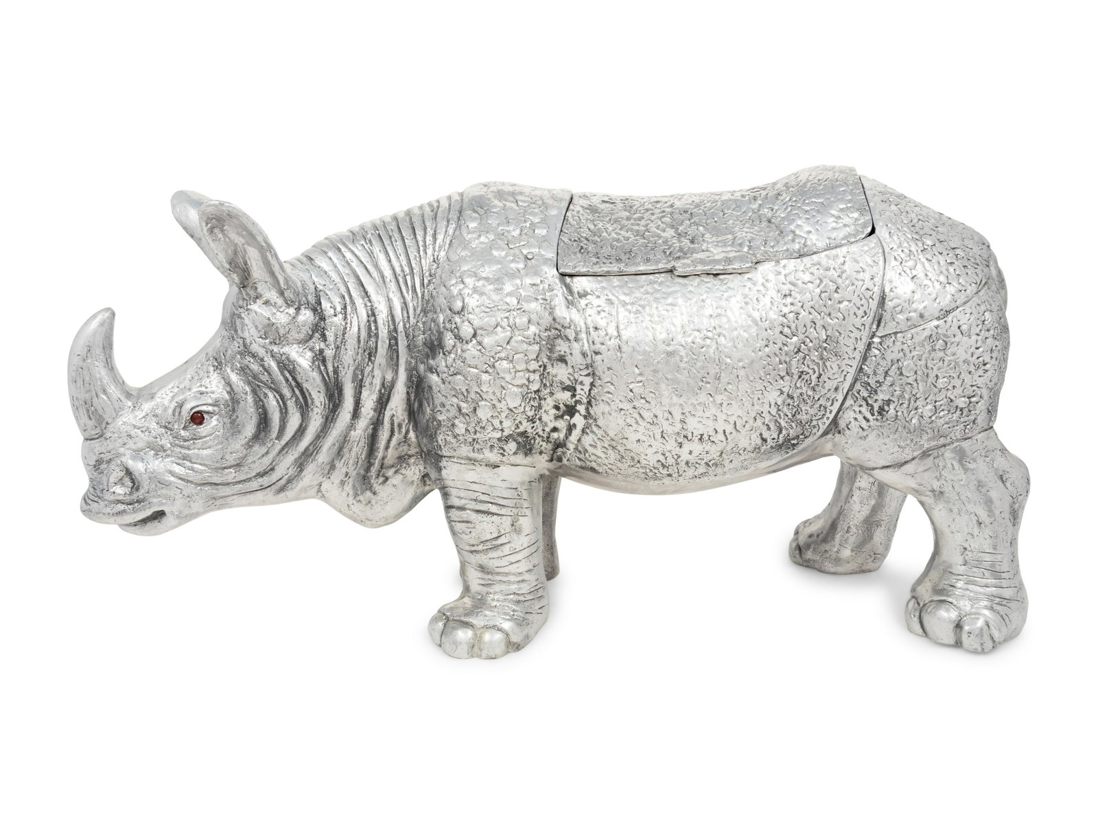 A Large Silvered Metal Rhinoceros-Form Wine Cooler: A Large Silvered Metal Rhinoceros-Form Wine Cooler Late 20th Century with carnelian-colored eyes. Height 15 5/8 x length 31 1/2 inches. Property From The Estate of Edwin L. Cox, Dallas, Texas