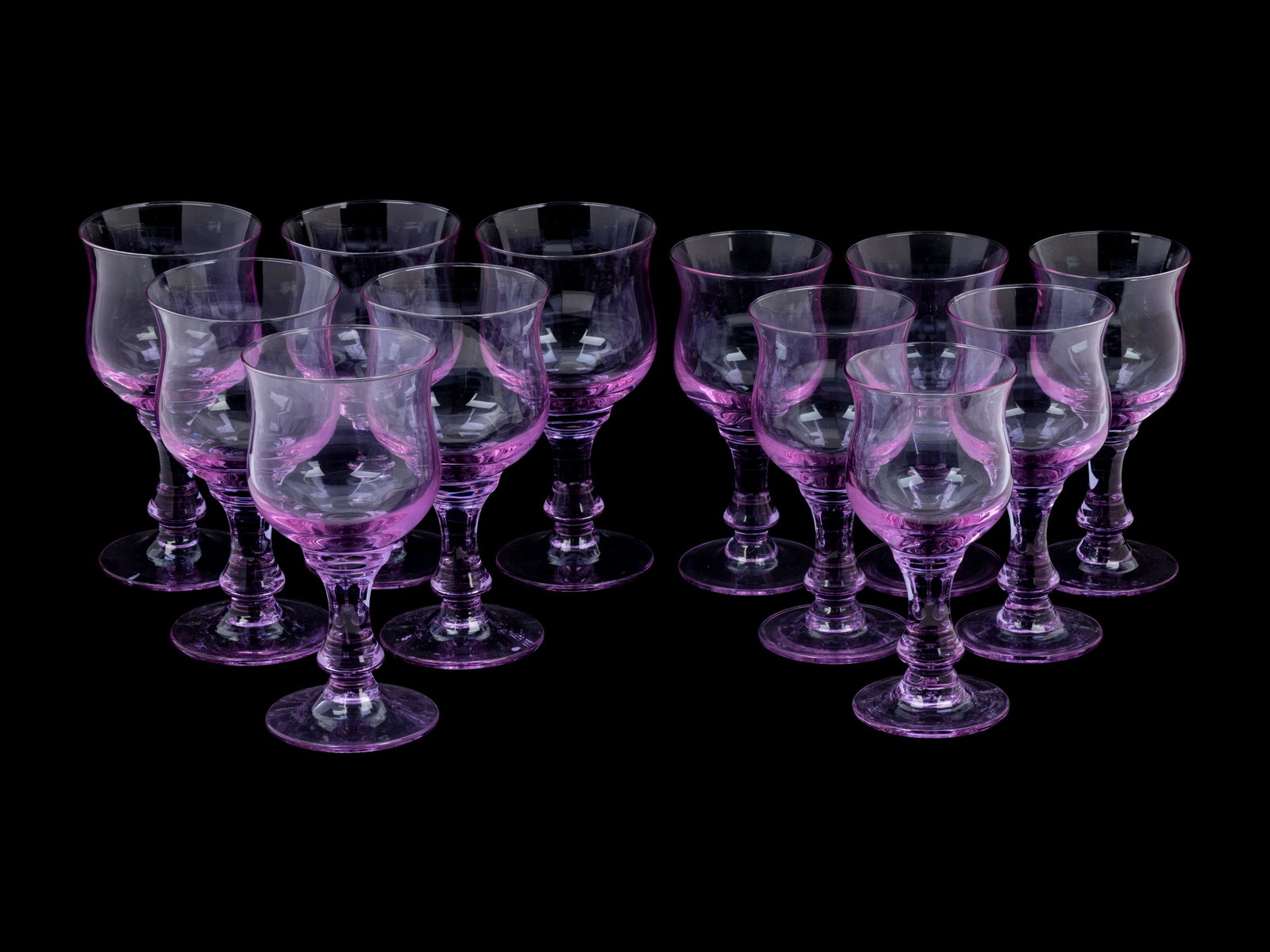 A Group of Colored Glass Stemware : A Group of Colored Glass Stemware 20th Century comprising twelve white wine glasses and six red wine glasses; 18 items total. Height of red wine glasses 7 1/8 inches; height of white wine glass
