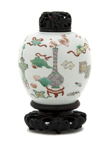 A Chinese Porcelain Ovoid Jar, Height of vessel 4 : A Chinese Porcelain Ovoid Jar, having enameled decoration of Buddhist emblems throughout, unmarked, with a pierced wood lid. Height of vessel 4 3/4 inches.