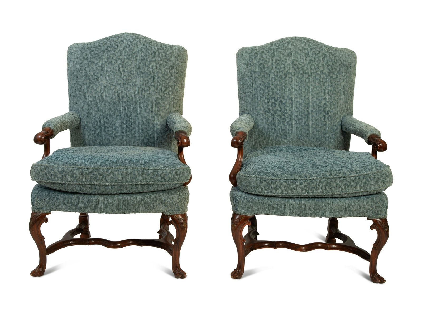 A Pair of Portuguese Carved Walnut Armchairs: A Pair of Portuguese Carved Walnut Armchairs 19TH CENTURY Height 41 1/2 x width 27 x depth 23 inches.