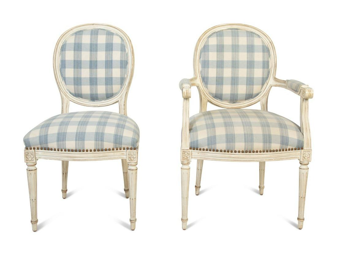 A Set of Ten Louis XVI Style Painted Dining: A Set of Ten Louis XVI Style Painted Dining Chairs 20TH CENTURY with blue and white plaid upholstery, comprising two armchairs and eight side chairs. Height 38 inches.