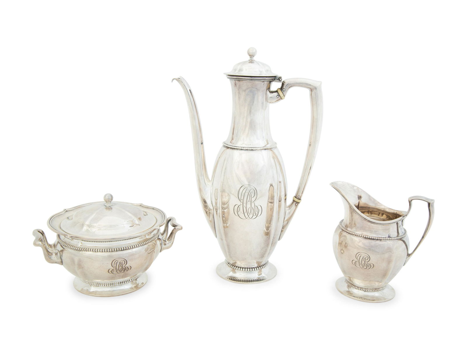 A Tiffany & Co. Silver Three Piece Coffee Service (1 of 4)