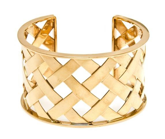 An 18 Karat Yellow Gold Criss Cross" Bracelet, Ver: An 18 Karat Yellow Gold "Criss Cross" Bracelet, Verdura, measuring approximately 38.00 mm wide. Stamp: VERDURA 750, (hand inscribed) VB3290. 42.60 dwts. Property from the Estate of Naomi T. Borwell, C
