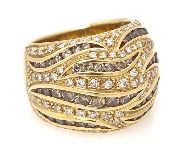An 18 Karat Yellow Gold, Brown and White Diamond R: An 18 Karat Yellow Gold, Brown and White Diamond Ring, Damiani, containing 151 round brilliant cut brown and white diamonds weighing approximately 3.00 carats total. Stamp: DAMIANI 750 3181 AL. Size 6