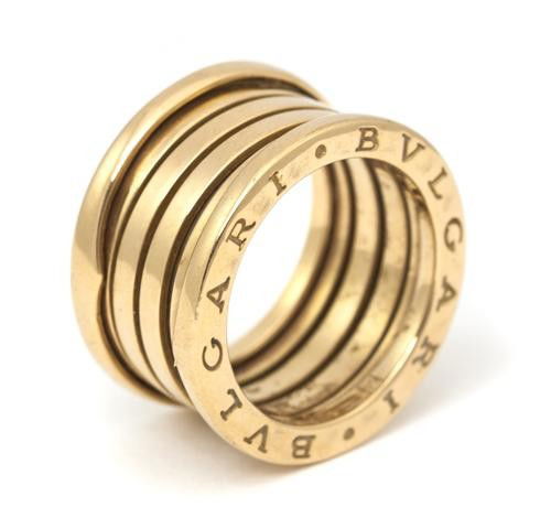 An 18 Karat Yellow Gold Expandable Ring, Bulgari,: An 18 Karat Yellow Gold Expandable Ring, Bulgari, Stamp: 750 (star) 2331 VI MADE IN ITALY BVLGARI 55. 9.25 dwts.