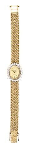 A 14 Karat Yellow Gold and Diamond Quartz Watch, D: A 14 Karat Yellow Gold and Diamond Quartz Watch, Devon, containing 28 round brilliant cut diamonds weighing approximately 0.70 carat total, 21.00 mm case diameter, matte textured gilt dial, applied gi