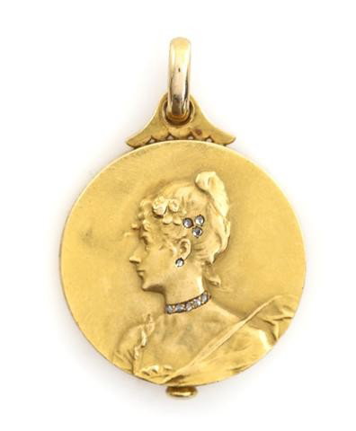 A Victorian 18 Karat Yellow Gold and Diamond Slide: A Victorian 18 Karat Yellow Gold and Diamond Slide Locket, depicting a bejeweled woman in profile with rose cut diamond accents, locket measures approximately 26.00 mm in diameter. 9.20 dwts.