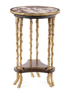 A Louis XVI Style Gilt Bronze and Marble-Top Gueridon: A Louis XVI Style Gilt Bronze and Marble-Top Gueridon in the Manner of Adam Weisweiler Late 19th/Early 20th Century Height 27 7/8 x diameter of top 18 1/8 inches.