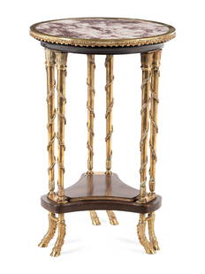 A Louis XVI Style Gilt Bronze and Marble-Top Gueridon: A Louis XVI Style Gilt Bronze and Marble-Top Gueridon in the Manner of Adam Weisweiler Late 19th/Early 20th Century Height 27 7/8 x diameter of top 18 1/8 inches.