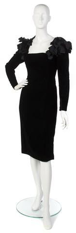 A Bill Blass Black Velvet Cocktail Dress,: A Bill Blass Black Velvet Cocktail Dress, with black satin bow detail at neckline. Labeled: Bill Blass. Property of a Lady New York City, New York