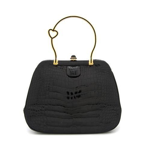 A Judith Leiber Black Alligator Evening Bag, 8 x 6: A Judith Leiber Black Alligator Evening Bag, with a black crystal heart handle. Stamped: Judith Leiber. 8 x 6 inches. Property from the Estate of Naomi T. Borwell, Chicago, Illinois