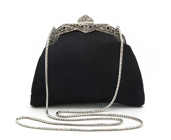 A Judith Leiber Black Silk Evening Bag, 6 1/2 x 5: A Judith Leiber Black Silk Evening Bag, with hidden silver strap and rhinestone detail at closure. Stamped: Judith Leiber. 6 1/2 x 5 1/2 inches. Property from the Collection of Beverly B. Bernstein, W